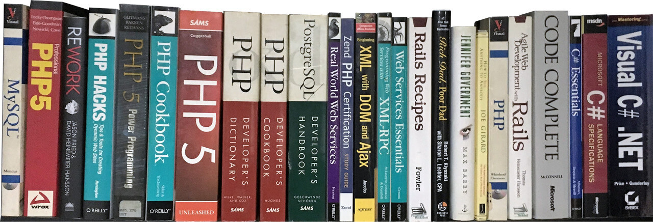 big row of programming books.