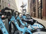 row of divvy rental bikes in the city.