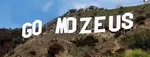 giant go mozeus letters on a mountain resembling the hollywood sign.