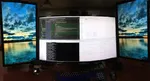 3 monitors and a keyboard.